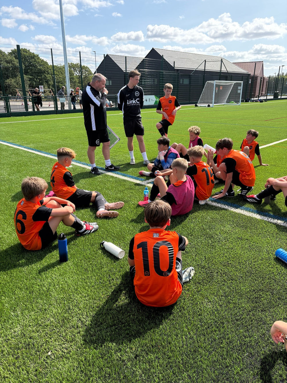 LINK coaches and young players during an outdoor football session
